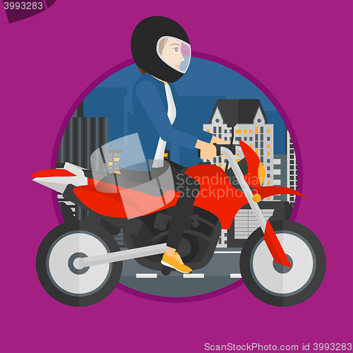 Image of Woman riding motorcycle.