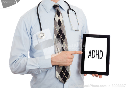 Image of Doctor holding tablet - ADHD