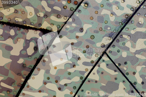 Image of Piece of aircraft grunge metal background, army camo