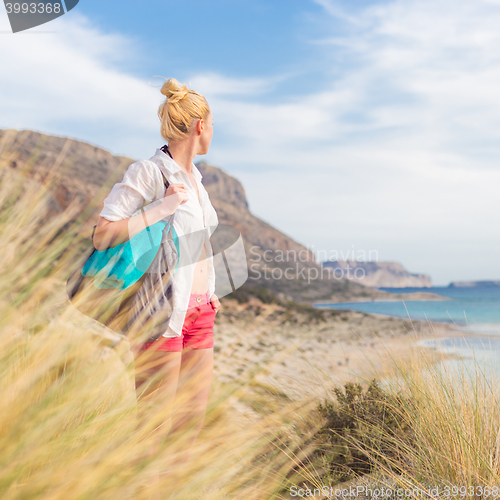 Image of Free Happy Woman Enjoying Sun on Vacations.