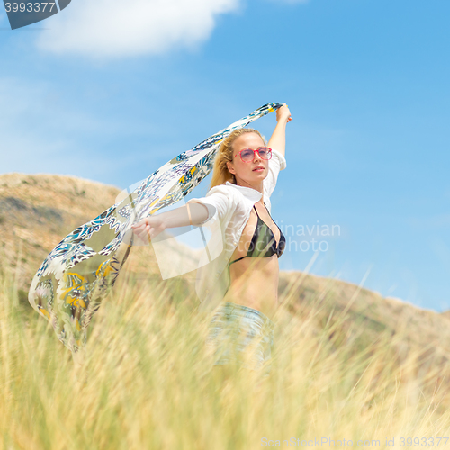 Image of Free Happy Woman Enjoying Sun on Vacations.