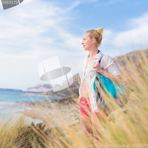 Image of Free Happy Woman Enjoying Sun on Vacations.