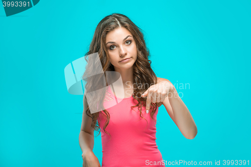 Image of The happy woman on blue background