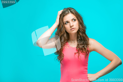 Image of The young woman\'s portrait with thoughtful emotions