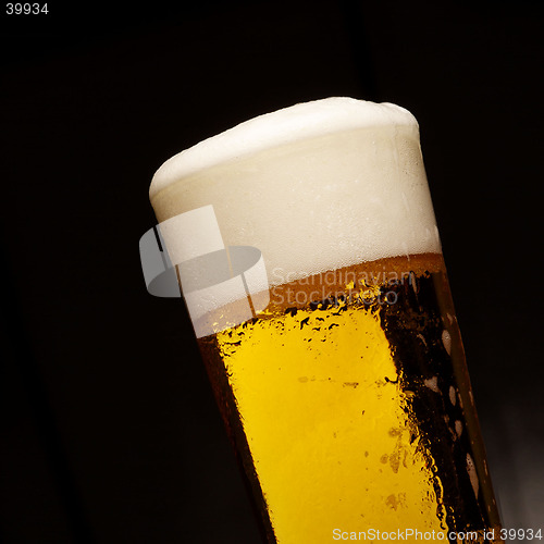 Image of GLASS OF beer on black background
