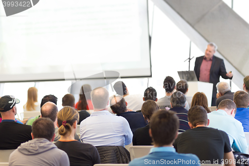 Image of Male speeker having talk at public event.