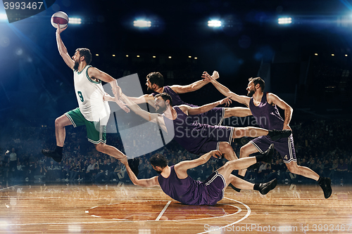 Image of The collage from images of one basketball player with a ball against the fans