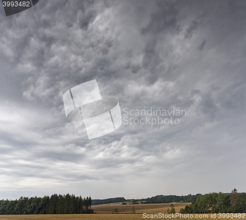 Image of Summer landscape with dramatic cloudy sky