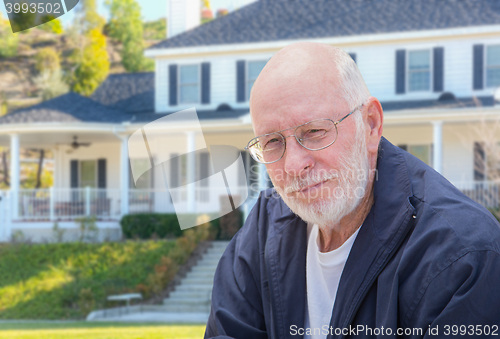 Image of Senior Adult Man in Front of House