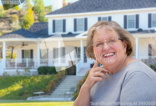 Image of Senior Adult Woman in Front of House