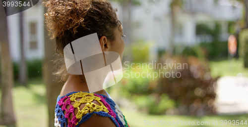 Image of Woman looking at out of focus background