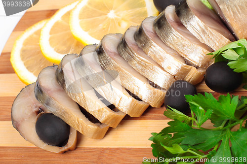 Image of herring fillets with herbs