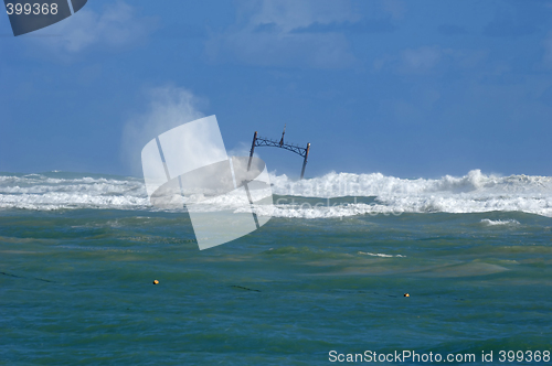 Image of Sunken ship wreck and stormy sea