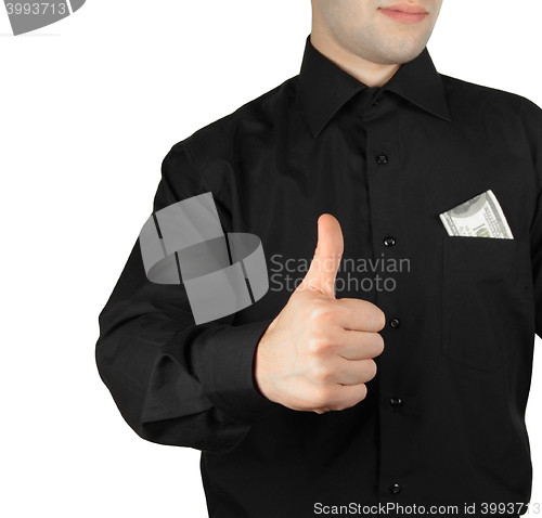 Image of Businessman with money in pocket showing okay sign