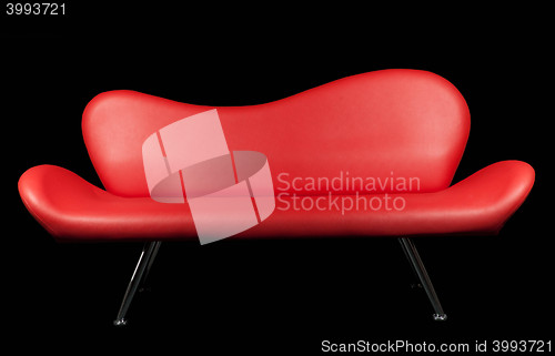 Image of Red sofa on black background
