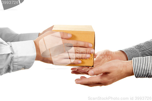 Image of Shop assistant gives the parcel