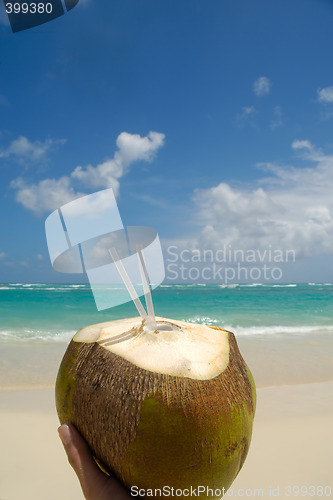 Image of Coconut drink and exotic beach