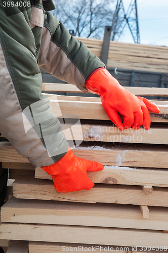 Image of Carpenter working at sawmill