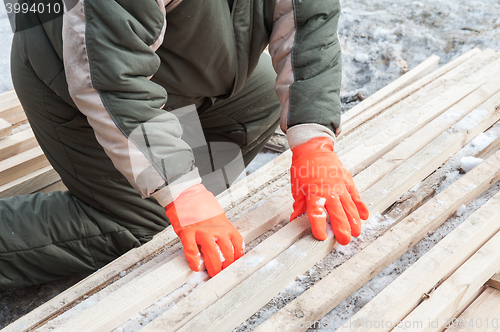 Image of Carpenter working at sawmill