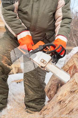 Image of Carpenter working at sawmill