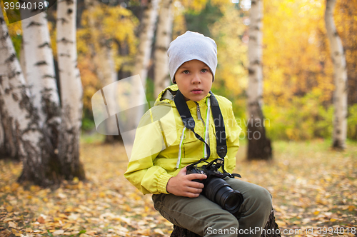 Image of Baby boy with camera