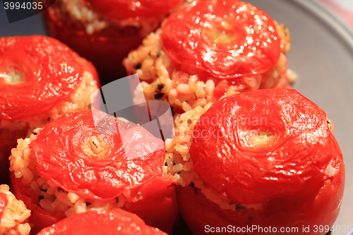 Image of grilled tomatoes with rice