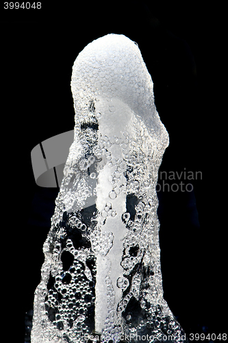 Image of water fountain isolated on the black background