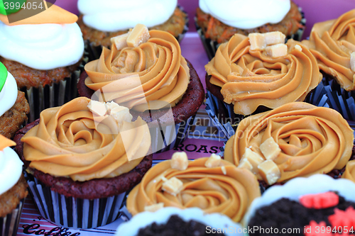 Image of caramel cupcakes background