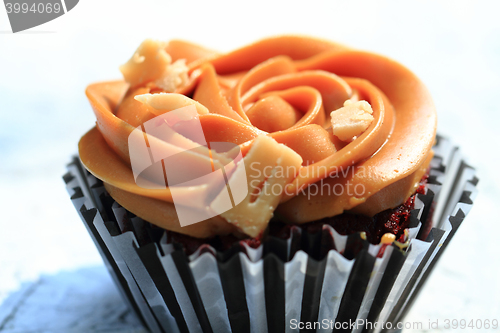 Image of caramel cupcake isolated