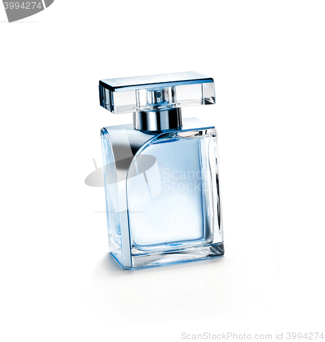 Image of Perfume bottle on a glass surface