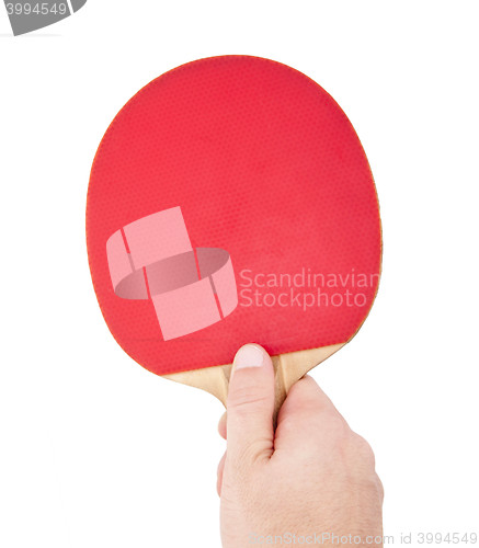 Image of Red table tennis racket in the hand