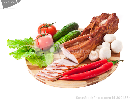 Image of sausage on plate with vegetables