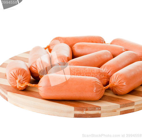 Image of delicious sausages on board