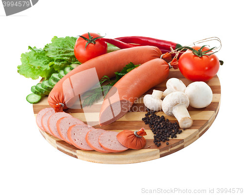 Image of sausage on plate with vegetables
