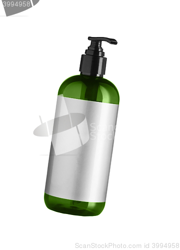 Image of Green cosmetic bottle isolated on the white