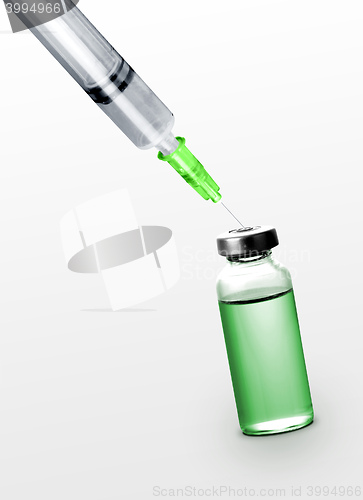 Image of syringe with drug bottle