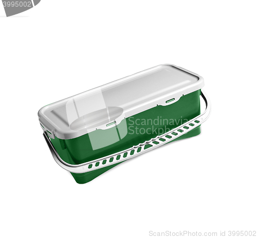Image of green plastic container on a white background