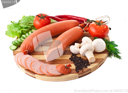 Image of sliced sausage with vegetables
