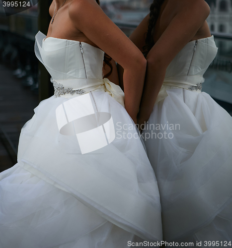 Image of Bride at the clothes shop for wedding dresses