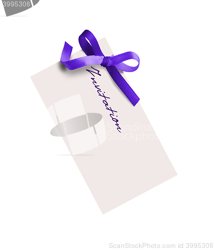 Image of close up of card note with purple ribbon on white