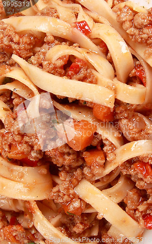 Image of spaghetti pasta with tomato beef sauce