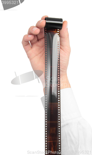 Image of man holding film