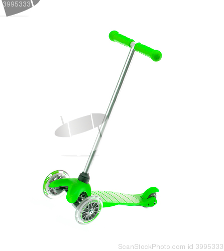 Image of children green scooter isolated on white.