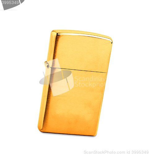 Image of golden lighter on a white background