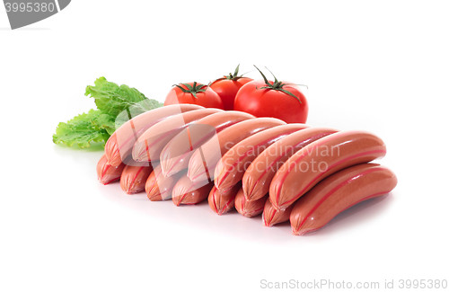 Image of sausages with tomato and salad