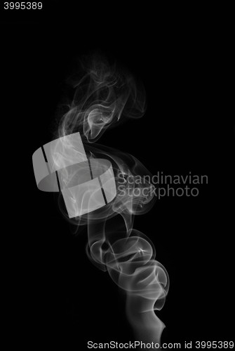 Image of Tobacco smoke. On black background.