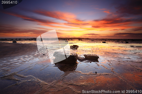 Image of Sunrise reflections across Long Reef Australia