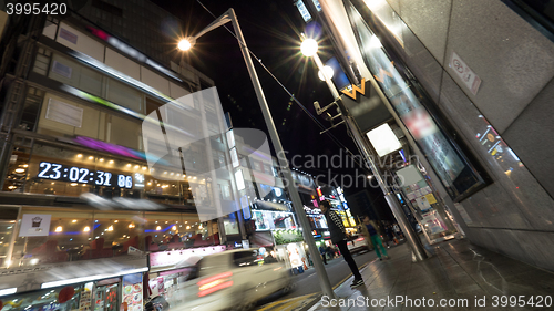 Image of Night street with illuminated banners on buildings. Seoul, South Korea