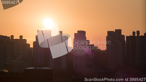 Image of City buildings at warm light of morning sun. Seoul, South Korea