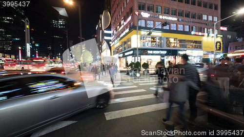 Image of Pedestrians on zebra crossing in night Seoul, South Korea